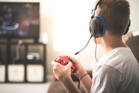 young person playing videogame
