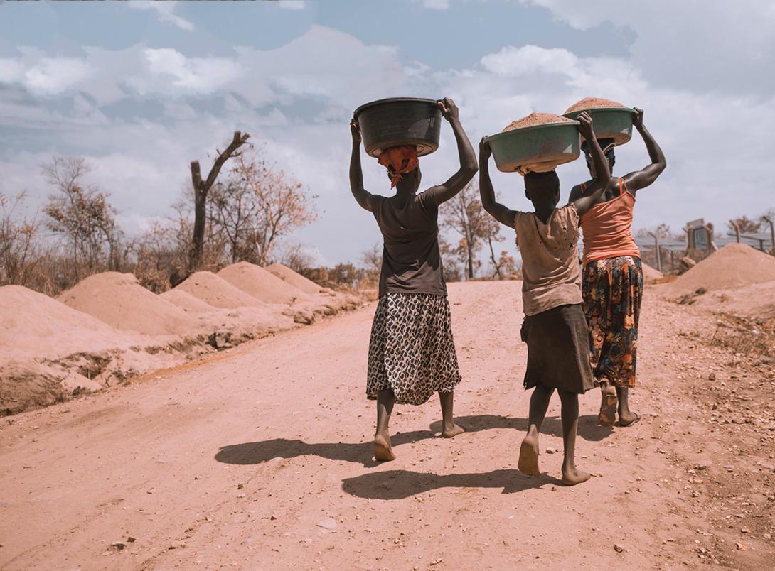 Women carrying food