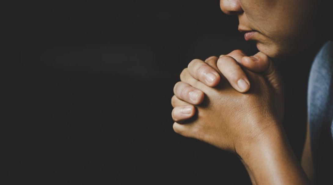 Man praying at the church